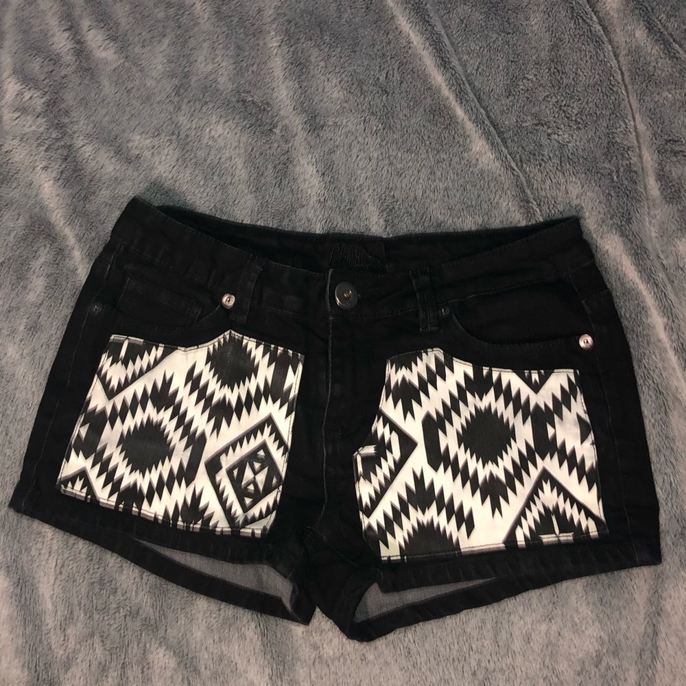 Black shorts with Aztec printed pockets